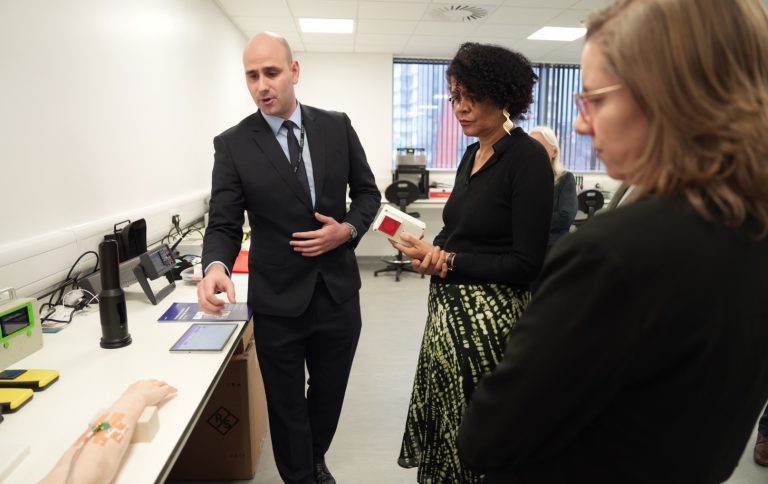 Patryk Kot, Business Development Manager at iiCON demonstrating sensor technology iiTECH to, Chi Onwurah MP, Select Committee Chair.